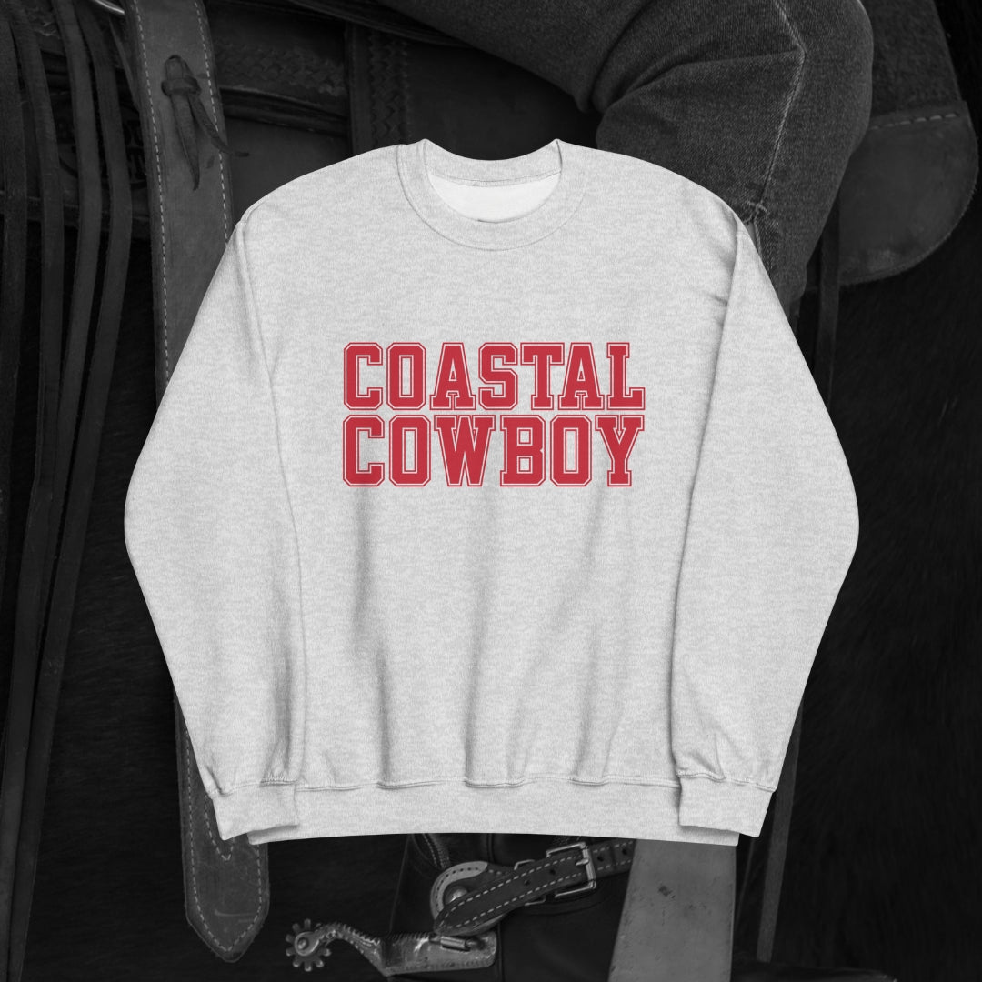 A light gray crewneck sweatshirt with the text 'COASTAL COWBOY' printed in red on the front.