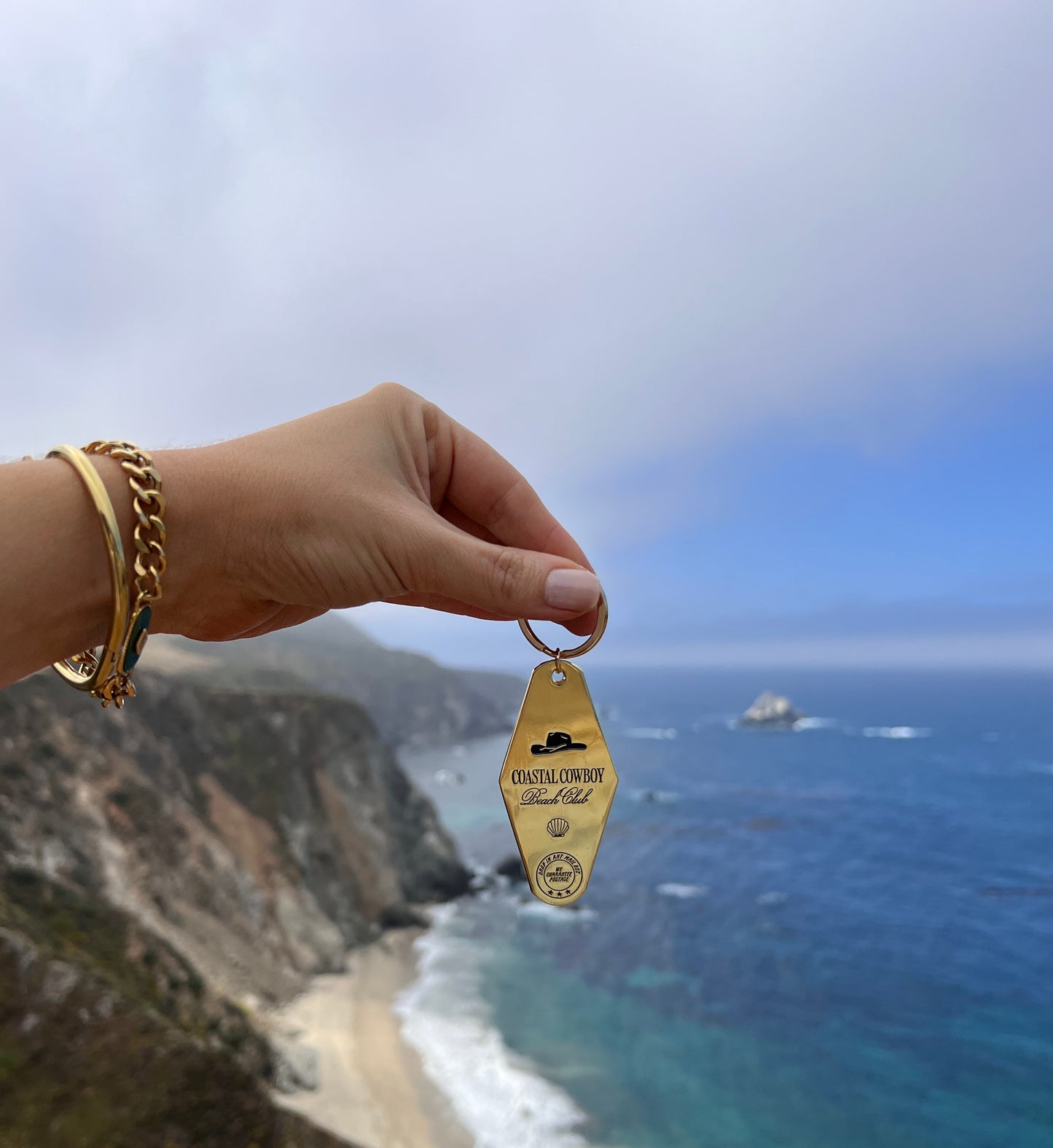 Gold Coastal Cowboy Beach Club Motel Keychain